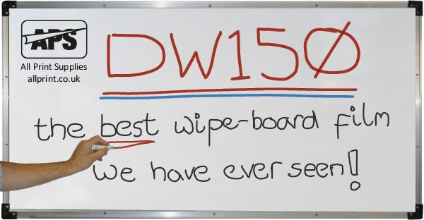 White wipeboard dry-wipe film DW150 in a classroom writing board frame with black, red and blue dry-wipe pen writing, saying the best wipe-board film we have ever seen!