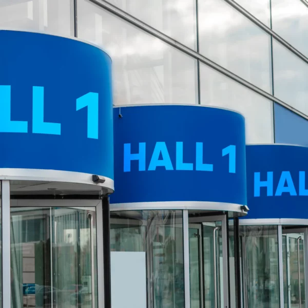 Wayfinding entrance signage created using Avery Dennison's 700 PF sign vinyls at a large exhibition hall to clearly identify door entry locations.