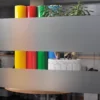 Avery Dusted decorative window film applied to an internal office window in 2 large strips to show the obscurity/privacy levels of this glass etch effect vinyl, with only daylight and vague colours being visible through the areas where the film has been applied.
