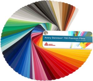 Avery Dennison 700 Perfomance Film vinyl sample colour swatch with the coloured sample pages fanned-out with an AD branded cover.
