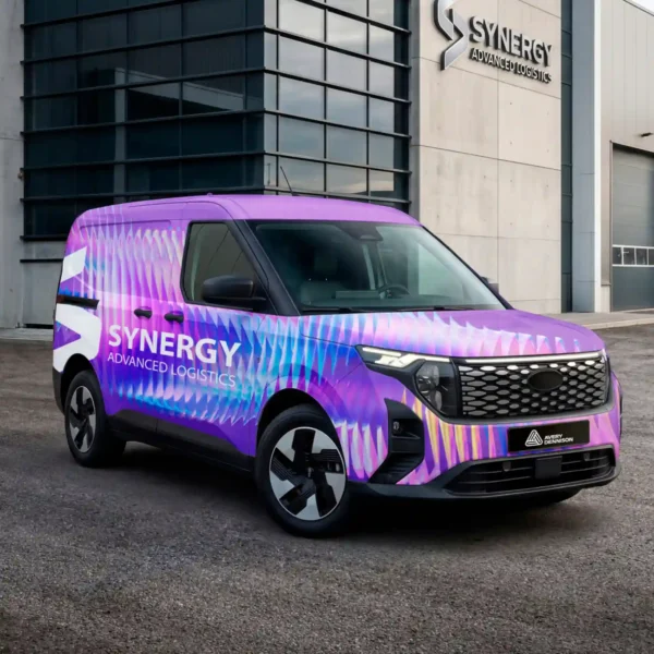 Printed corporate van livery, a full 3D vehicle wrap with Avery Dennison MPI 1103 Smart Wrap+ print vinyl and DOL 1360 Z laminate outside company offices.