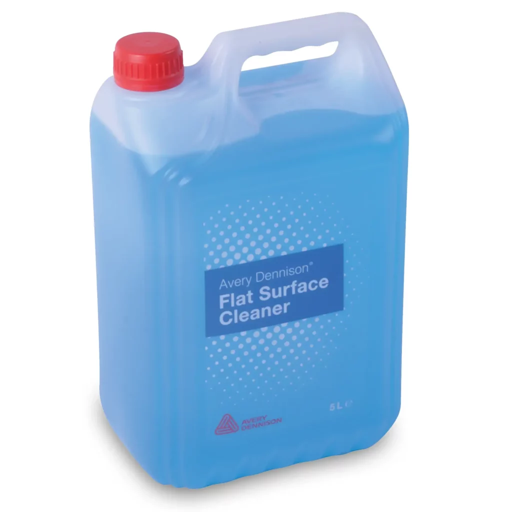 Avery Dennison flat surface cleaner used by signmakers and graphics professionals applying self-adhesive graphics. In it's 5L rectangular bottle container, you can see the blue cleaning fluid through the transparent container, with a carrying handle grip at the top and a bright red screw cap.