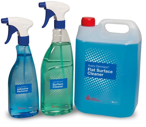 A group shot of the 3 bottles of signmakers fluids from our range of Avery Dennison graphics fluids. From left to right in the photo: A blue bottle of Adhesive Remover, in the middle Green Surface Cleaner bottle and on the right is a large 5Litre bottle of blue Flat Surface Cleaner.