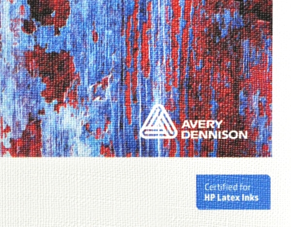 Avery Dennison MPI 8726 canvas textured white self-adhesive wall decoration vinyl shown in close up detailing what the embossed textile like pattern looks like when printed and unprinted.