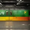 BIOND environmentally friendly printing films stating the product branding that has been printed and applied onto train-side panels, stating 'A branded film today for a carbon free tomorrow'.