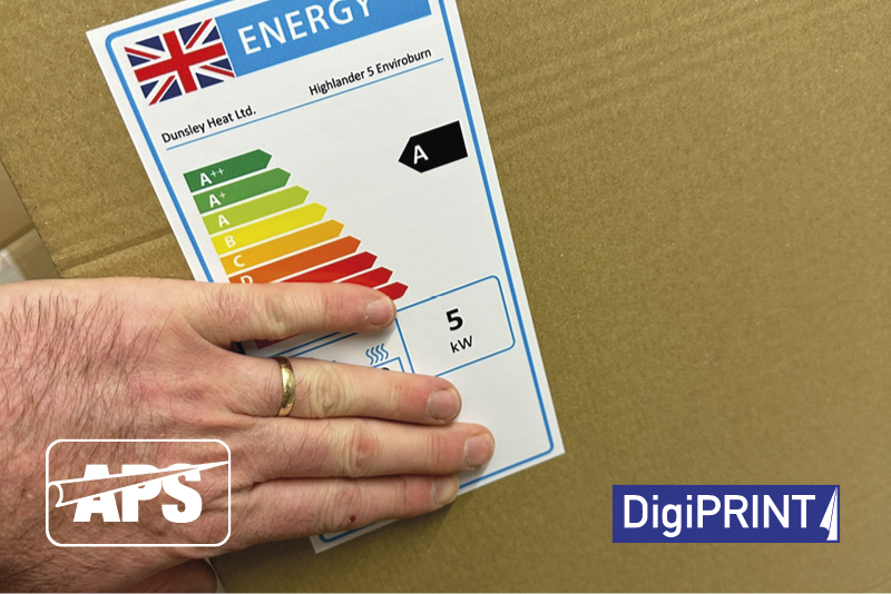 Applying the printed self-adhesive gloss white label to the product packaging as an information label describing the boxes product contents energy efficiency.