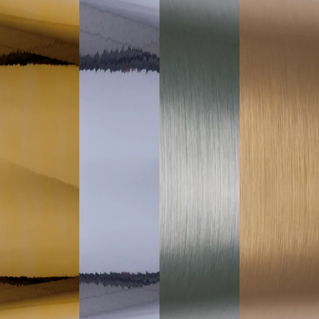 DigiPRINT range of metallic self-adhesive sign films come in a selection of metallised vinyl finishes, including brushed gold, and silver and gloss silver and gold. This image shows the range of 4 metallised face film colours and textures lined up next to each other, from left to right: Gloss Gold, Gloss Silver, Brushed Silver and Brushed Gold.