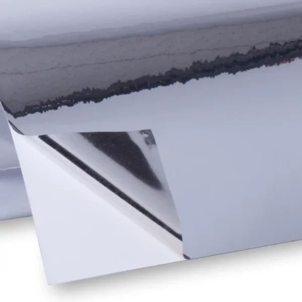 DigiPRINT TSGS3 two-way gloss silver metallic print films for sign and print applications on a roll with the corner peeled back to reveal the look of the silver on the reverse side of the film.