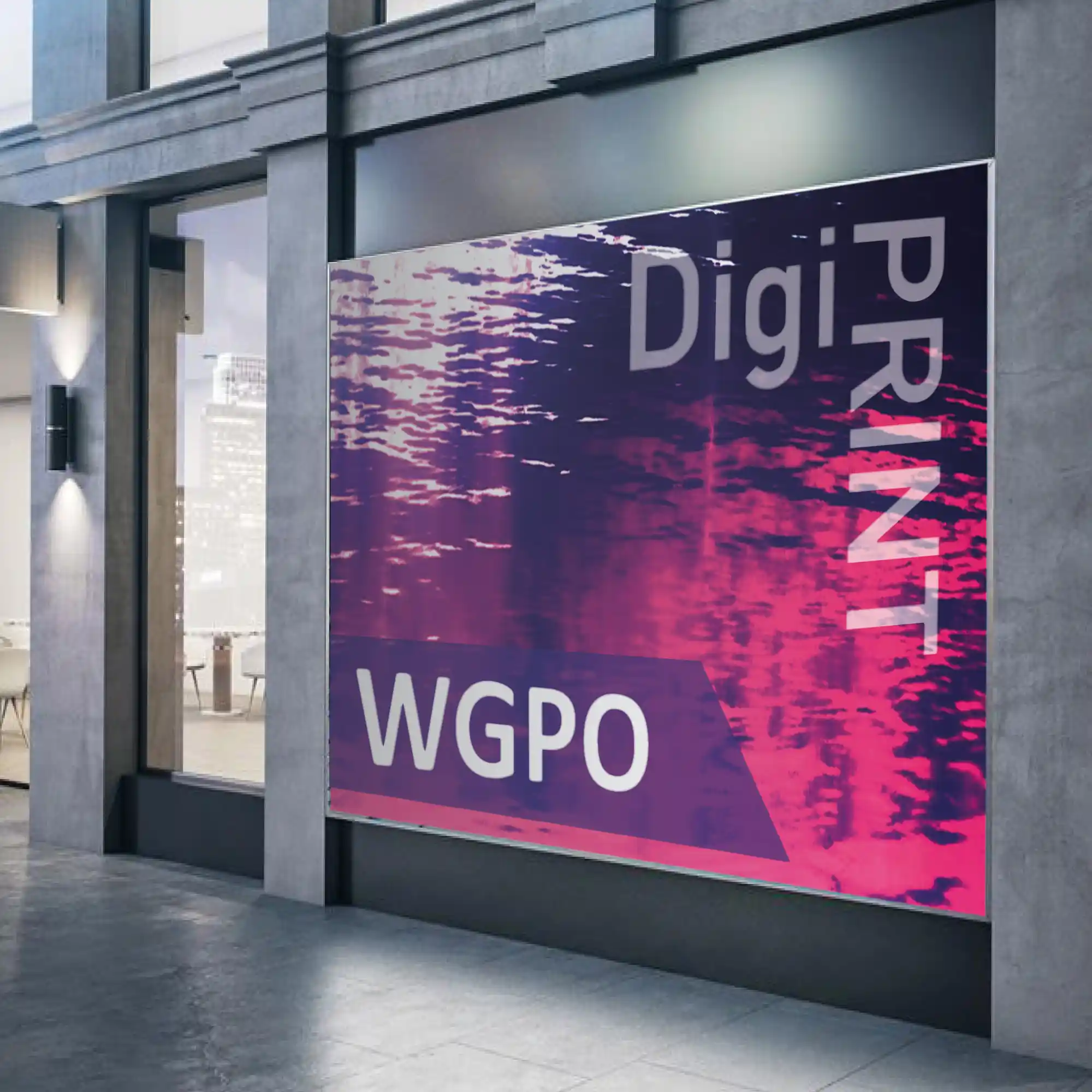 DigiPRINT WGPO white gloss printing vinyl with grey opaque permanent self-adhesive for prints applied to flat surfaces is pictured being used for an external wide-format promotional print campaign sign on a High Street shop signboard.