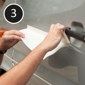 Dry apply sign vinyl: squeegee over