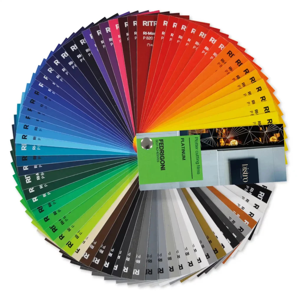 A swatch showing the full spectrum of Fedrigoni P800 Platinum Opaque Series self-adhesive sign vinyl film colours that are available in the range, fanned out 360 degrees.
