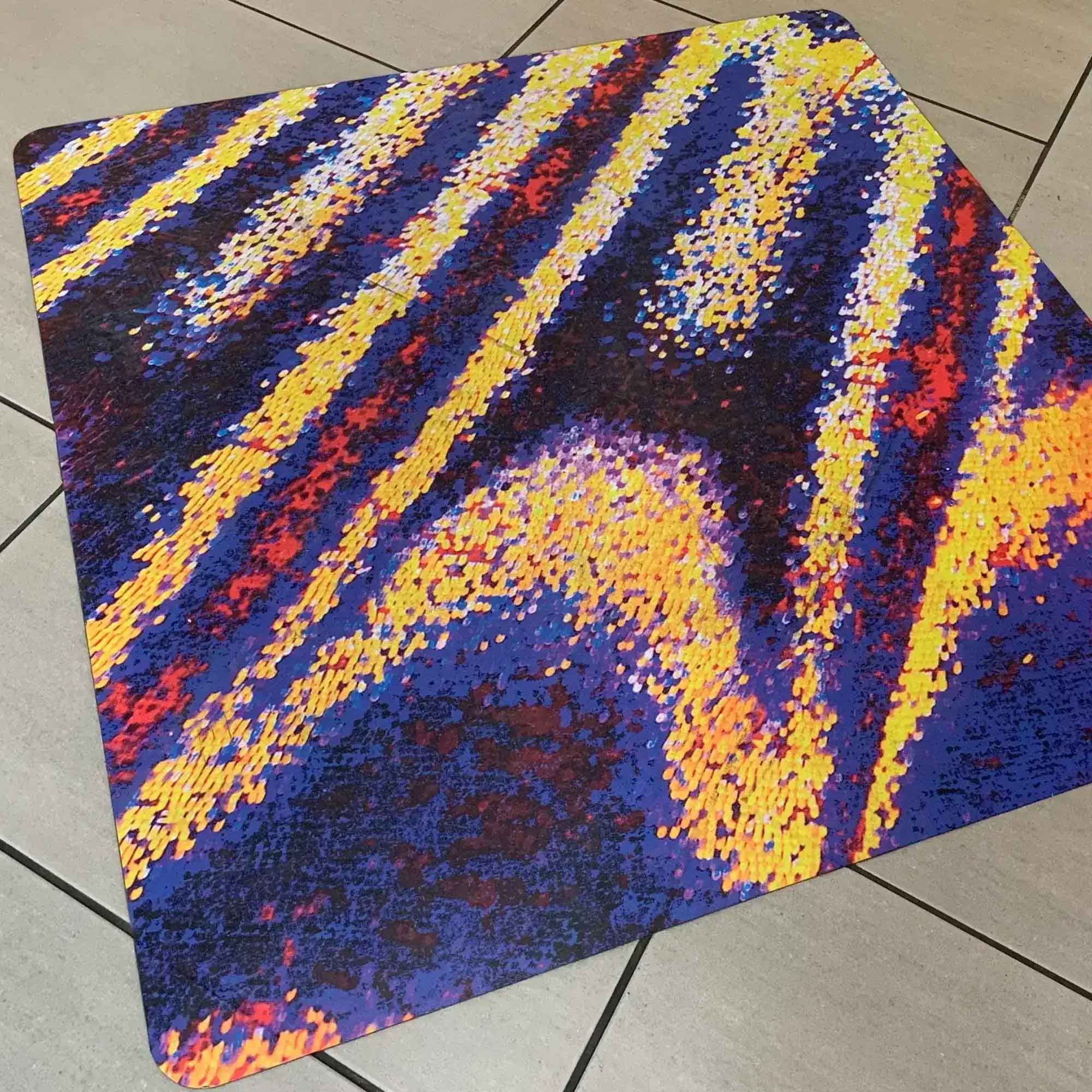 GUARDIAN Prop12, PVC free, R12 slip-rated floor print laminate protects this colourful, abstract designed floor graphic that has been applied onto a ceramic tiled floor surface.