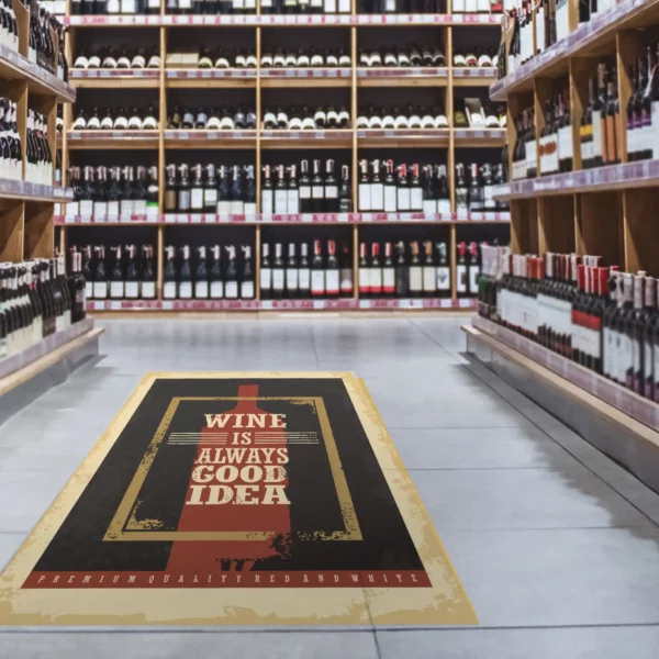 FloorSharK one part internal floor graphic solution printed with 'wine is always a good idea" text and applied to the floor in the middle of the wine section aisle of an off-licence / supermarket.