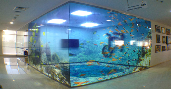 Gloss clear vinyl printed and applied to interior glass windows. The transluscent effect in this design makes the fish tank design really come to life.