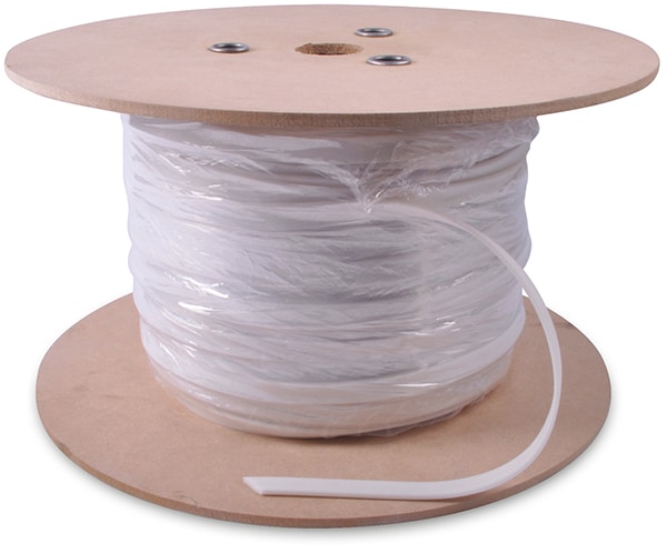 White Silicone stitch-on keder-lip tape for fabric signage is pictured wound around the core of its drum packaging which consists of two circular shaped MDF boards, one at the top and one at the bottom, with a roll core attaching the two through the centre to hold the tape securley in storage.