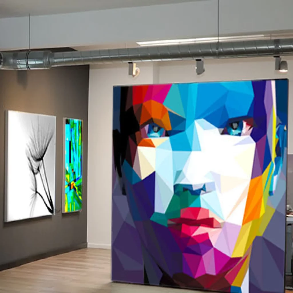 Large format frontlit display prints using KREA Blackback Soft 1056-16 printable fabric with artistic imagery installed within a gallery/exhibition setting.