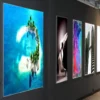 KREA Speedy 911-11 fabric display print media digitally printed and wall mounted into backlit light frames for vibrant art prints in an art gallery exhibition setting.