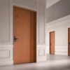 LX Hausys BENIF self-adhesive interior films range can be applied to most surfaces, including to doors to change them from boring to stylish and interesting, like this hotel corridor where the door surfaces have been wrapped in the same brown leather textured vinyl, including door trim and architraves, all finished off with black door numbers and handles.