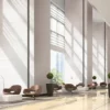 LX Hausys BENIF self-adhesive interior films will also cover walls and are available in a huge choice of different colours, textures and special finishes. These decorative vinyls bring new life and a quick change of style to any room, like this high ceiling reception area with large high windows that are complimented by the finish of the light colour and delicate stone texture of the vinyl wrapped walls.