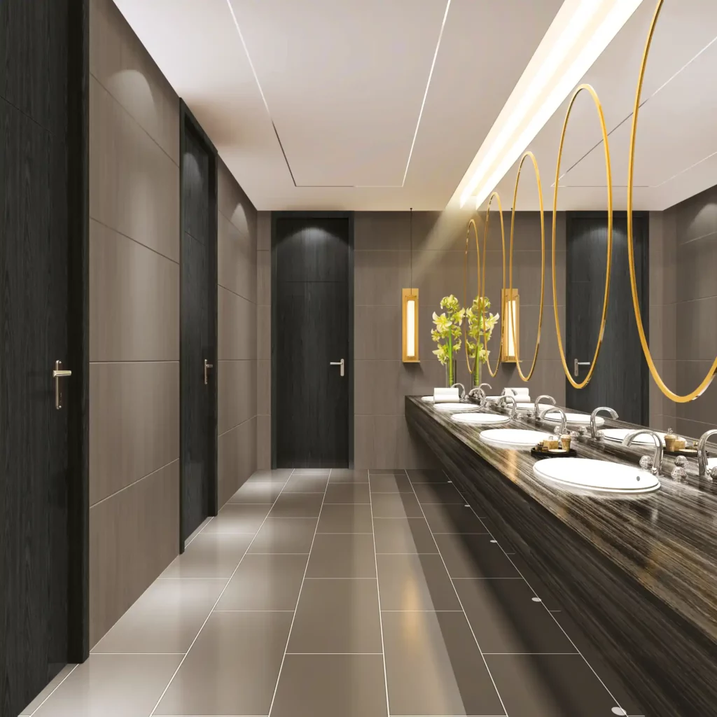 The LX interior film range of wood finishes contains a huge choice of different colours, patterns and textures, with a small selection applied to create this contemporary, sophisticated looking toilet area, including a dark walnut pattern decorating the walls, cubicle doors and washroom sink counter top.