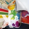 NU-COAT M11-P-X monomeric print vinyl with airXit permanent adhesive for easier, bubble-free applications applied to a school corridor wall with printed graphics in a bright and colourful paint spatter design with inspirational and informative text.