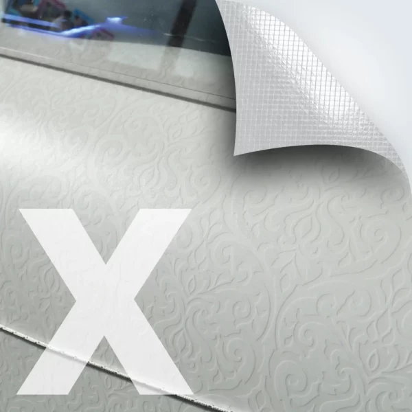 M21-P-X self-adhesive, bubble-free gloss clear print film being printed with white ink in a floral, alkor alba style pattern for application as a window print graphic. The top right corner of the picture includes a superimposed graphic with a folded down corner and cross-hatched lines that depict the embossed air release liner characteristic of this monomeric graphics film.