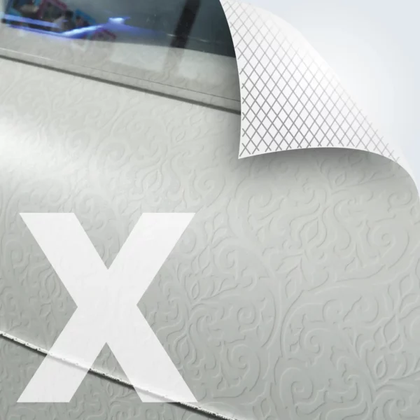 M21-P-X self-adhesive, bubble-free gloss clear print film being printed with white ink in a floral, alkor alba style pattern for application as a window print graphic. The top right corner of the picture includes a superimposed graphic with a folded down corner and cross-hatched lines that depict the embossed air release liner characteristic of this monomeric graphics film.