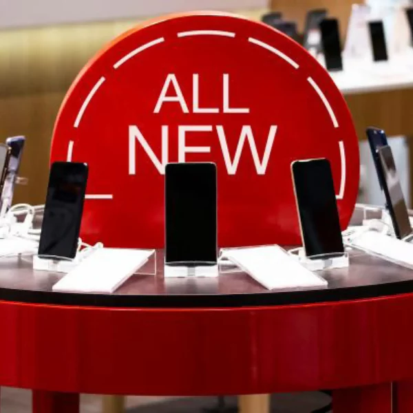 MACal 8300 coloured sign vinyls used for in-store visual merchanding with white cut lettering text applied over red film which is also applied to the outsode of a retail desk, demanding attention and promoting the retail products on display.