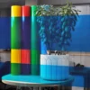 MACcrystal 8437-02 Light Blue transparent coloured self-adhesive window film sample applied to an internal office window to show the level of transparency and the decorative colour transformation effect that this tinted colour vinyl provides.