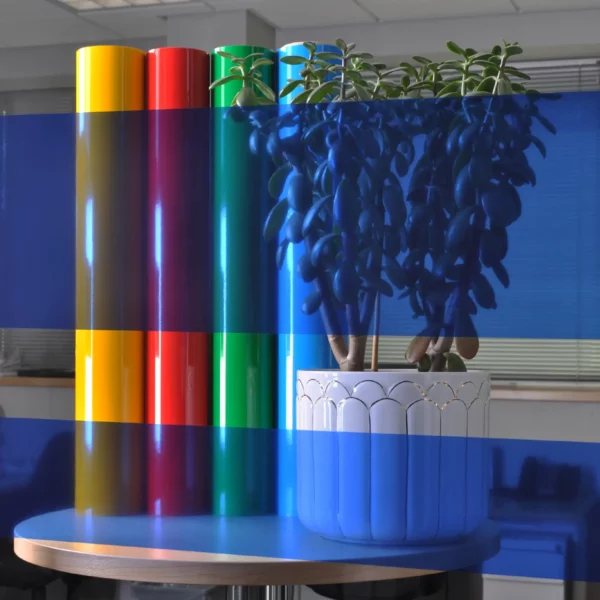 MACcrystal 8437-03 Medium Blue transparent tinted window vinyl applied to an internal office window to show the level of transparency and the colour transformation effect that this decorative self-adhesive film gives to windows, especially effective when sunlight directly shines on it, with the colour projected through the film amd into the room.