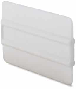 4 inch white ribbed harder plastic squeegee with two central ribs for finger grip.