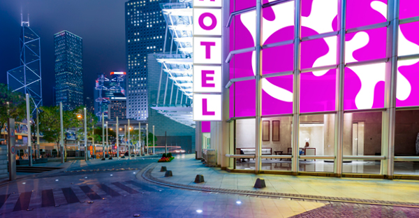 MACal 9700 illuminated sign vinyls for backlit signs and light box graphics sre shown used to great effect on a large scalle on the lobby entrance windows and hotel signage showing all the super vibrant colour of the vinyls as they shine out in the dusky night light.