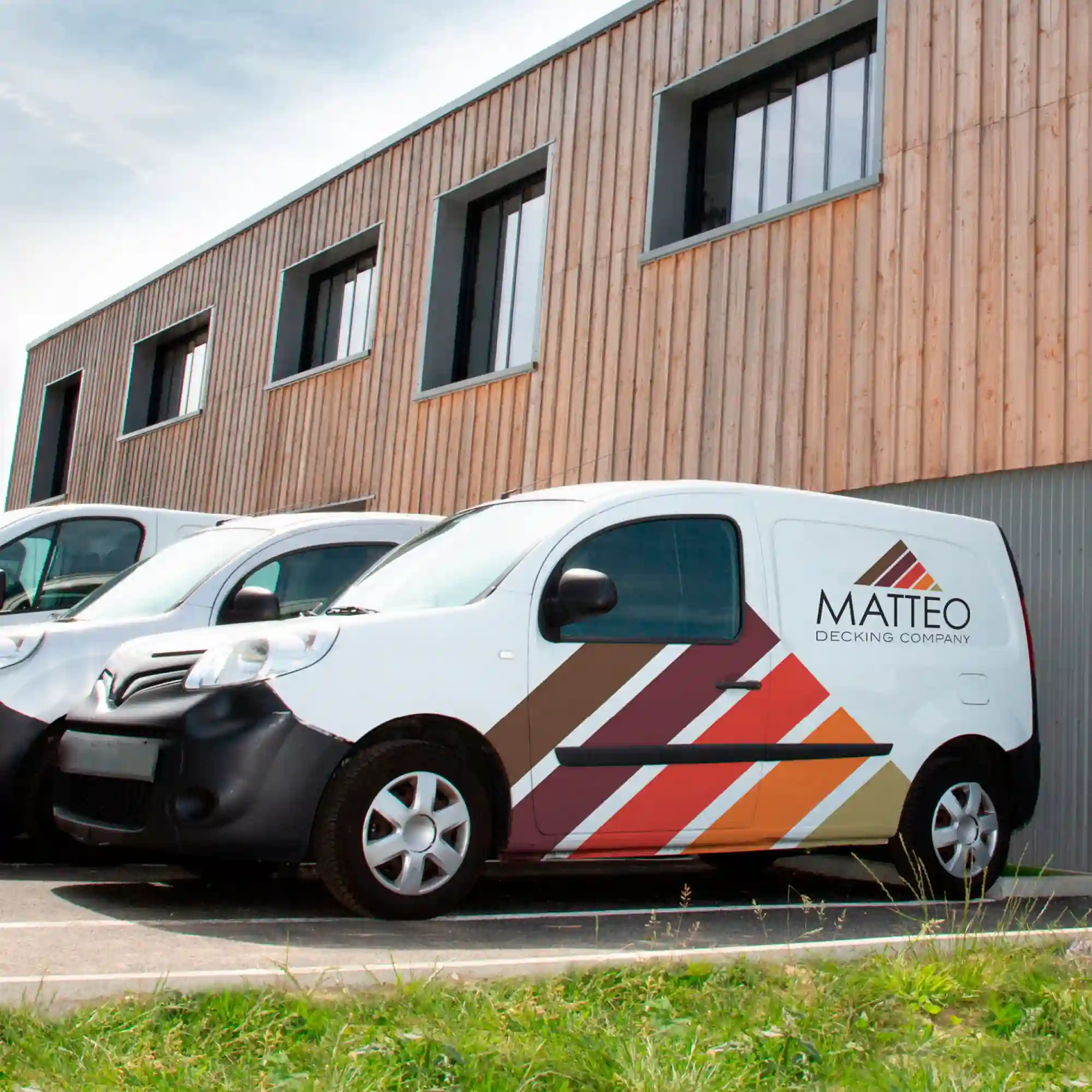 Mactac 9800 coloured self-adhesive vinyls have been used to decorate the sides of a fleet of white company vehicles with logos and other simple corporate cut-vinyl coloured branding.