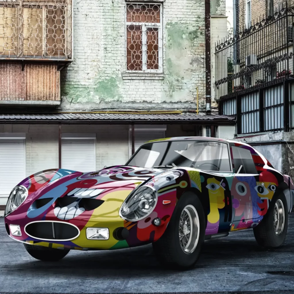 Modern art style printed vinyl graphic laminated with Mactac cast gloss vehicle wrap laminate, LF 10700 CG-UV, parked in juxtpsition against a contrasting old, rustic courtyard in the background.