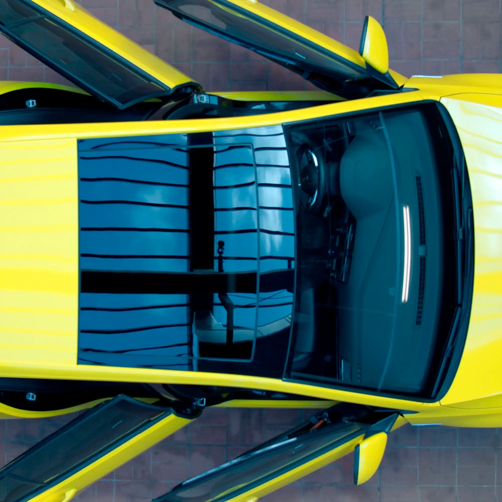 Mactac Colourwrap yellow coloured wrap vinyl has been used to colour-transform the entire car. Viewed from above with all 4 doors open, all contours of the vehicle have been wrapped, including wing mirrors, roof, trims, bonnet... everything except the windows!