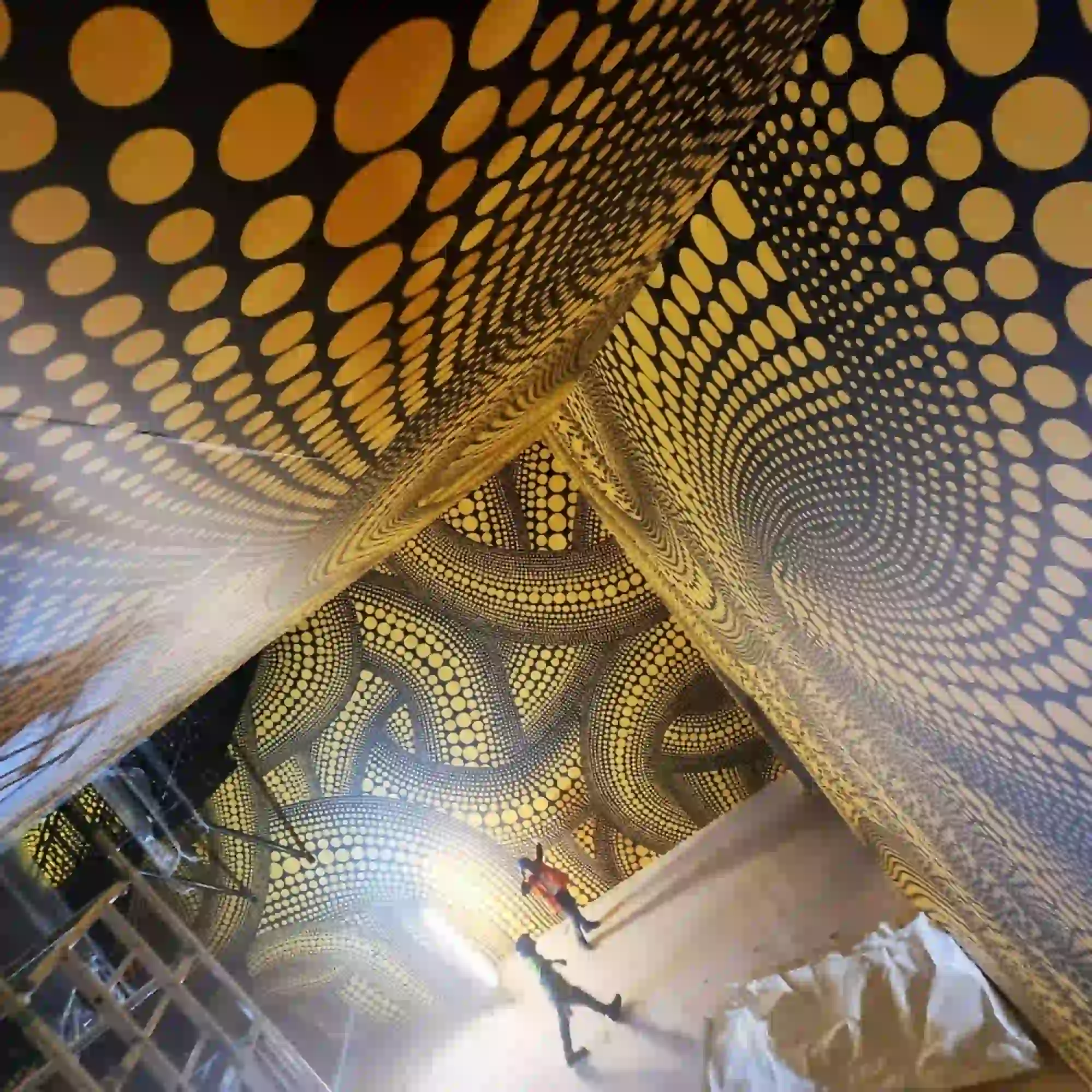 Mactac JT 8700 Series of self-adhesive grey opaque print vinyls for applications onto flat surfaces for mi-term printed graphics, such as shown here applied to all walls and ceiling surfaces in this large exhibition hall.