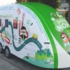 Mactac LF 9500 CG-UV gloss lamination film protecting a printed corporate promotional branding design that is applied over the full extent of a road trailer with its curved, aero-dynamic shaped surface.