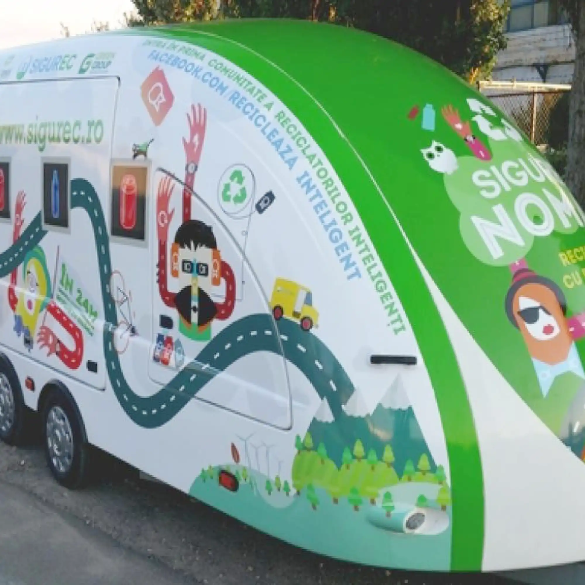 Mactac LF 9500 CG-UV gloss lamination film protecting a printed corporate promotional branding design that is applied over the full extent of a road trailer with its curved, aero-dynamic shaped surface.