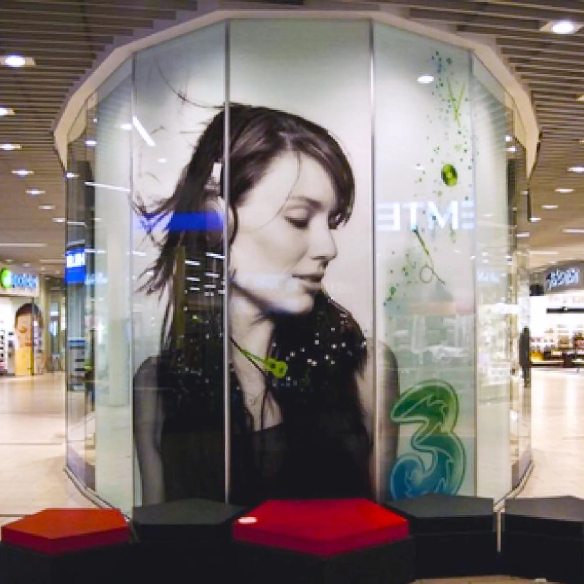 Mactac LF8700 CM UV matt laminate applied to shopping precinct promotional signage prints provides up to 4 year protection for self-adhesive printed graphics for indoor and outdoor retail signs and graphic displays that have been printed with all digital inks, including UV.