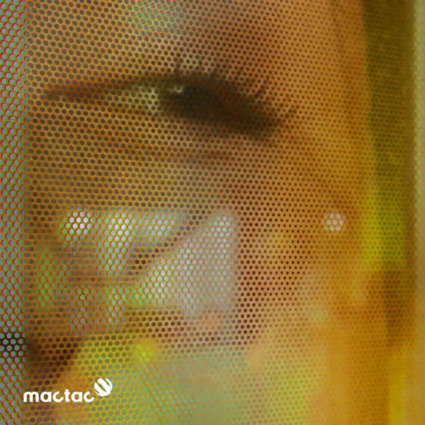 A close-up view of a striking eye graphic printed on Mactac JT 7300 WG-PB Series one-way vision window film. The perforated vinyl delivers vibrant image quality from the outside while allowing clear visibility from within, ideal for impactful storefront or vehicle window graphics.