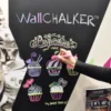 Mactac WallChalker self-adhesive blackboard film applied to a promotional wall which is being drawn on with liquid chalk pens to advertise cupcakes.