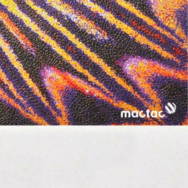 Close-up of Mactac WW Leather textured self-adhesive wall vinyl, highlighting its premium leather-like embossed pattern and vibrant printed sample—ideal for upscale interior décor and branding projects.