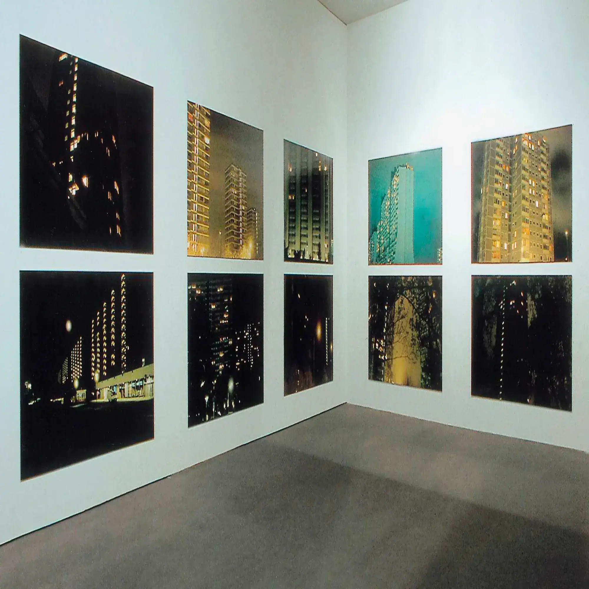 Mount film DM3 for mounting graphics is shown here fixing photographic display print art that is fixed to a gallery wall.