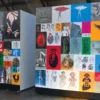 MPI 3020 HOP matt white high opacity self-adhesive digital print film decorates the walls of some exhibition display boards that feature a large collage of different artistic and brightly printed images.