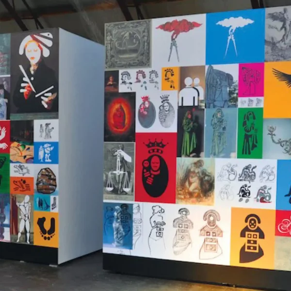 MPI 3020 HOP matt white high opacity self-adhesive digital print film decorates the walls of some exhibition display boards that feature a large collage of different artistic and brightly printed images.