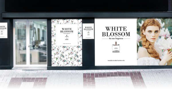 MPI 3021 HOP high opacity removable self adhesive print vinyl appied to this store front window advertising display.