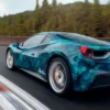 MPI 1105 EA RS, easy apply repositionable and slideable digital cast print wrapping film with a printed blue honeycomb design fitted onto a sportscar is shown speeding around a race track with all the sharp and smooth contours and features of the car accentuated brilliantly by the glossy vinyl and the geometric shape of the design.
