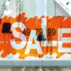 Neschen UV Print PP Easy Dot Transparent self-adhesive window graphic allows for quick, easy-to-apply and reposition promotional prints onto smooth or flat surfaces to create stunning UV printed promotional window graphics and large format display prints, such as this large translucent printed 'SALE' retail window promo print.