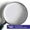 NU-COAT bubble-free 'airxit' X embossed adhesive pattern under a magnifying glass showing the detail of the cross-hatch pattern of the structured liner/adhesive that allows air to escape resulting faster and easier application of graphics with no bubbles.