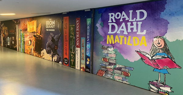 NU-COAT 'M' Monomeric series print film, used here to decorate a long school wall with inspirational, educational imagery for book reading.